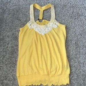 Yellow t-back, racer, back tank. White lace on front wooden piece on back.